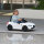 Elektro Kinderauto BMW M4, Sound & Licht, 3-5 km/h, inkl. Fernsteuerung, für 3-5 Jahre, weiß